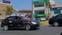 Ventanilla: Taxista se dio a la fuga y casi atropella a una policía de tránsito que lo intervino