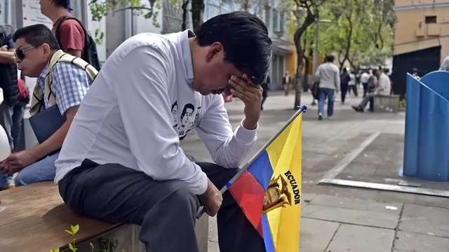Amigos y familiares de los ecuatorianos asesinados están de luto. Foto: AFP