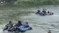 Migrantes arriesgan sus vidas al cruzar río Bravo de la frontera entre México y EE. UU.