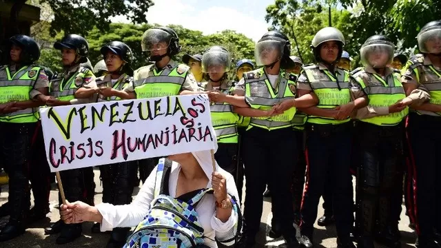 Manifestantes opositores al gobierno de Nicolás Maduro. (Vía: AFP)