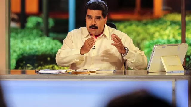 Maduro acusa a la burguesía de paralizar el aparato productivo / AFP