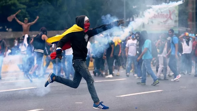 Opositores salieron a las calles en Caracas. Fotos: AFP